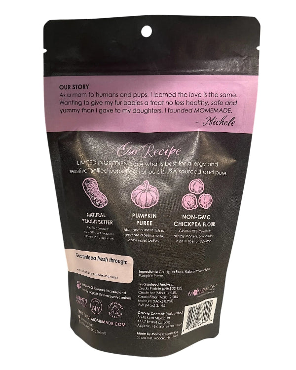 Back view of a matte black stand-up pouch for dog treats, featuring a pink 'Our Story' banner and product ingredient illustrations on a white background.