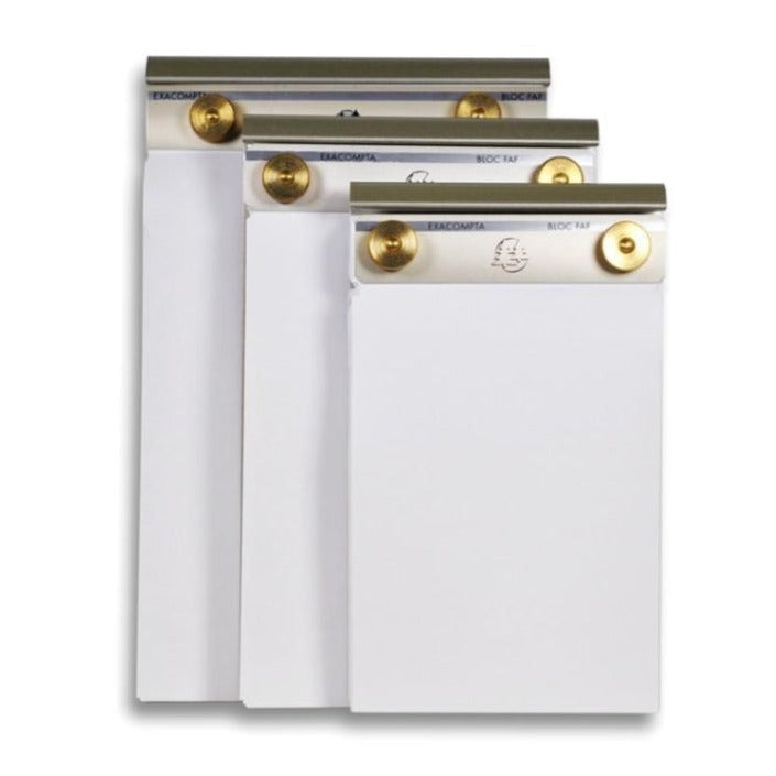 a set of three white notepads with brass knobs