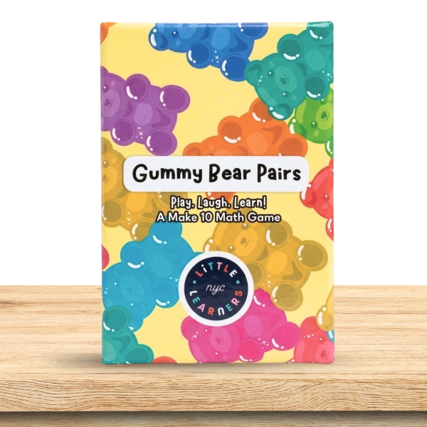 Colorful box of 'Gummy Bear Pairs' math game on a wooden surface
